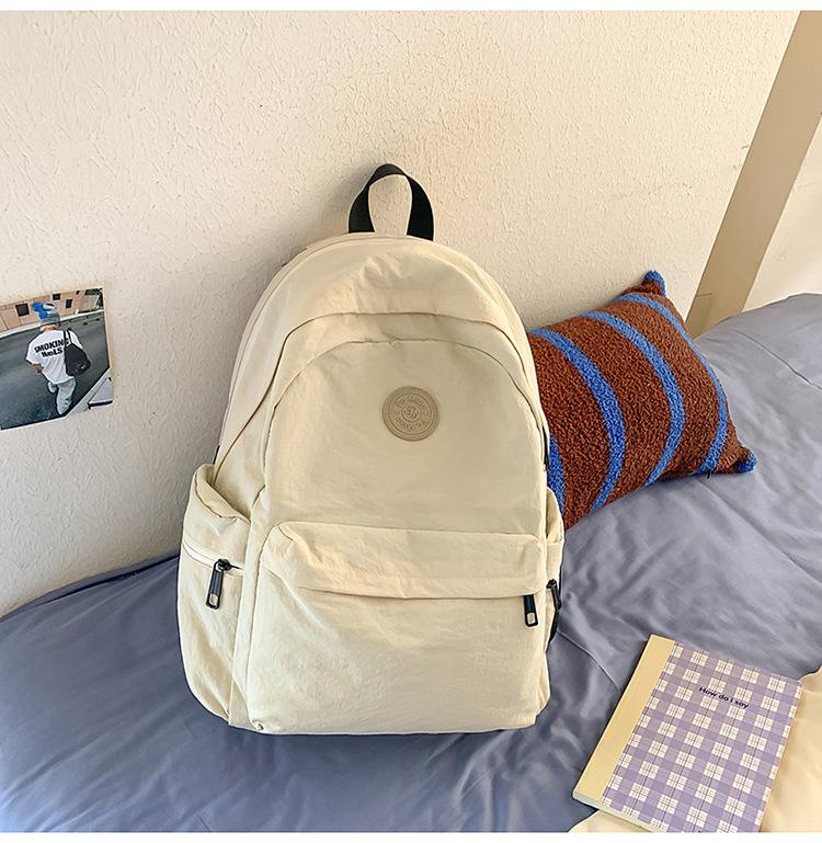 School bag Japanese simple solid color backpack light commuting large capacity student school bag casual versatile outdoor travel backpack