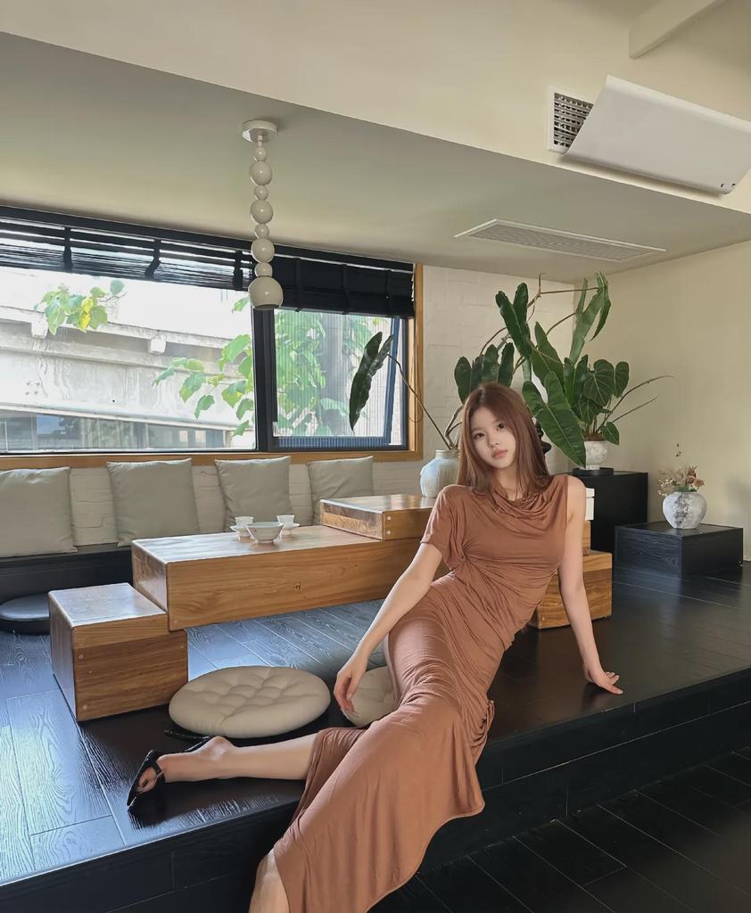 SUBHUMAN Women's European & American Style | Orange Irregular Pleated High Collar One-Shoulder Knit Top