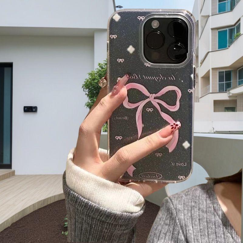 Pink bow in English is suitable for Apple 16 mobile phone case 15promax glitter soft case 14 15 large holes XS simple.