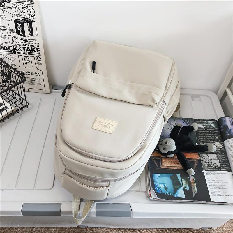 Kvinners ryggsekk Ensfarget kvinnelig multi-lomme Uformell reiseveske for kvinner Høykvalitets skolesekk for tenåringsjente Bok-rygsekk