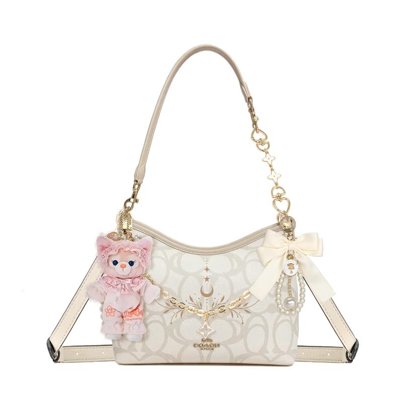 

COACH shoulder bag [Customized bag] Laurel Signature 31 brand print gold accessories doll bow pearl chain coated canvas Poems of yarn basic style золотий
