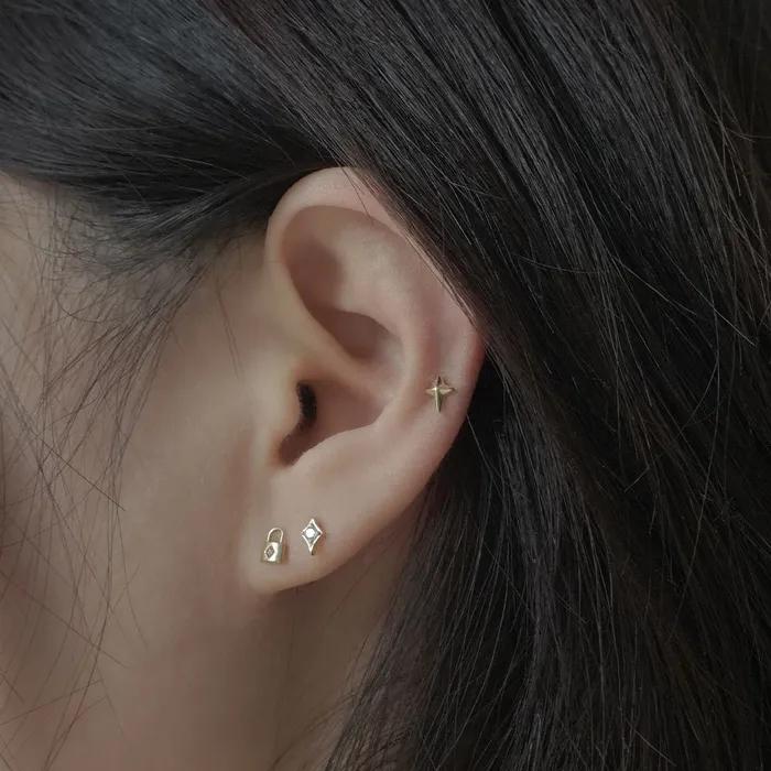 14k flash light cubic piercing