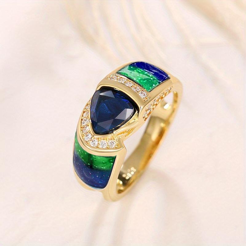 

Elegant Vintage Triangle Cut Sea Blue Ring with Synthetic Zirconia Accents – Golden-Plated Copper Band for Women, Perfect Wedding or Bridesmaid Party 9