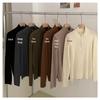 Women's Merino Wool Pullover: Soft, Loose Knitwear with Zipper Half-High Neck, Perfect for Autumn/Winter Layering.