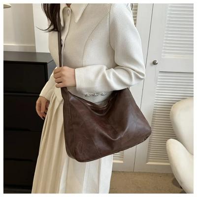 Retro Nischen-Schulter-Umhängetasche für Damen, vielseitige Umhängetasche, große Kapazität, neue Mode