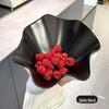 black wavy fruit plate