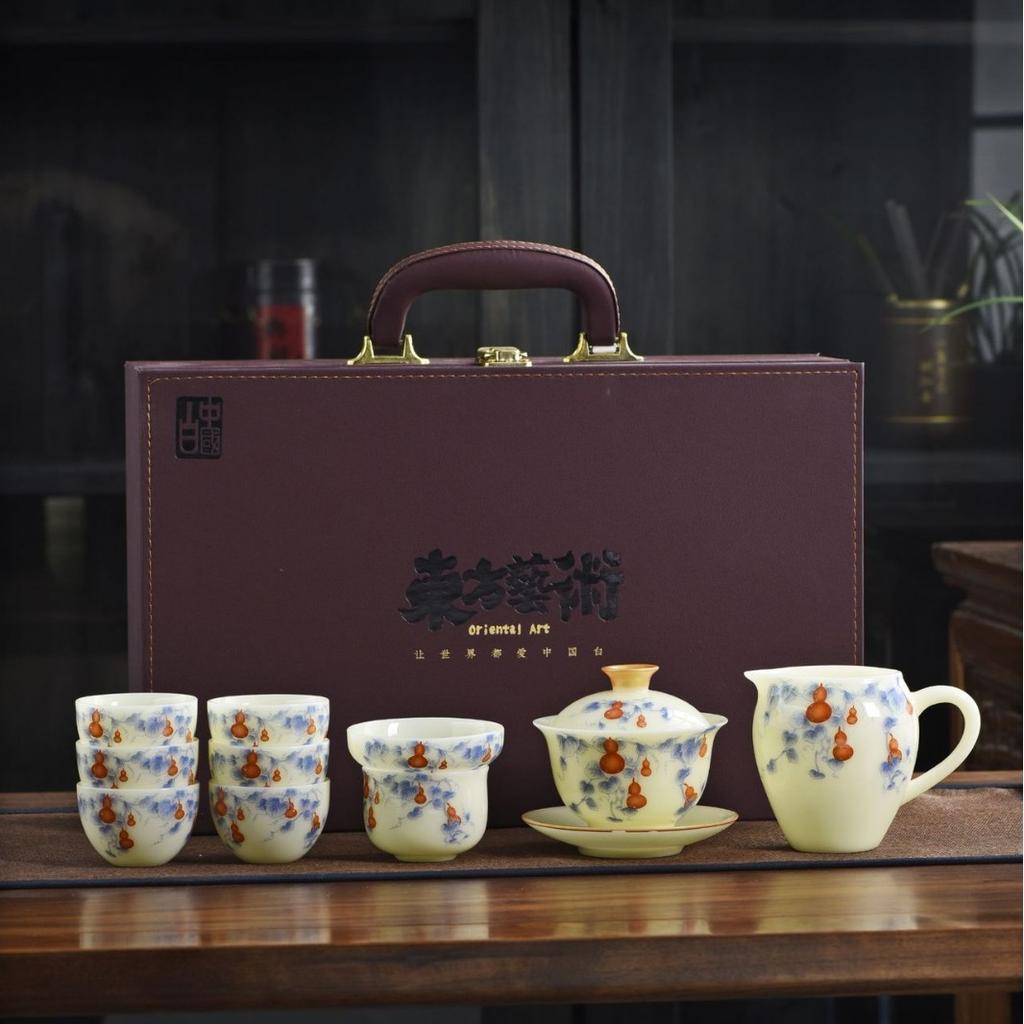 The whole set of jade tea set, household hoverable cover bowl set, gift box, kung fu tea set, business gift set, souvenir gift