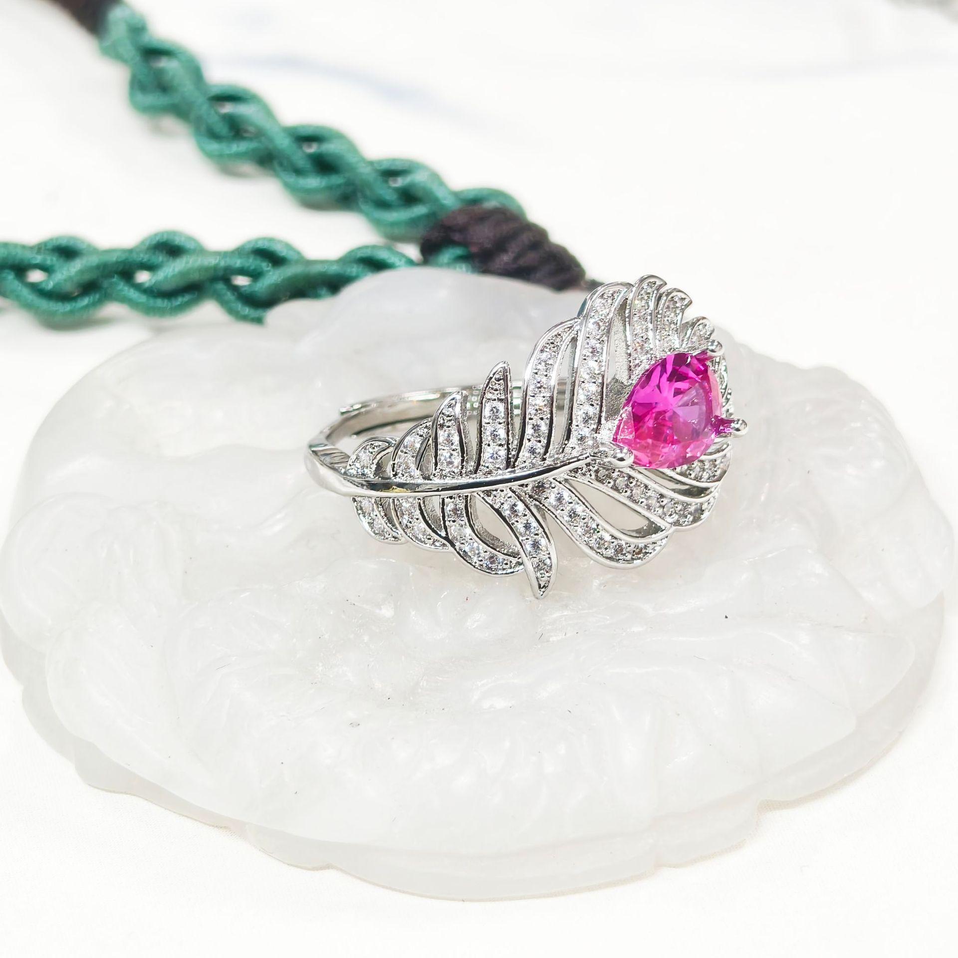 Gusien Elegant Feather-Shaped Jewelry Set: Stud Earrings, Pendant, and Ring in Versatile Court Style for Women