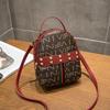 Multifunctional backpack, personalized fashion, rivet printing, student leisure trend women's bag
