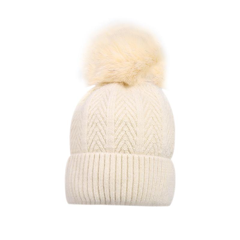 Thickened cold-proof and warm wool ball pullover hat autumn and winter European and American winter outdoor stacking hat knitted hat