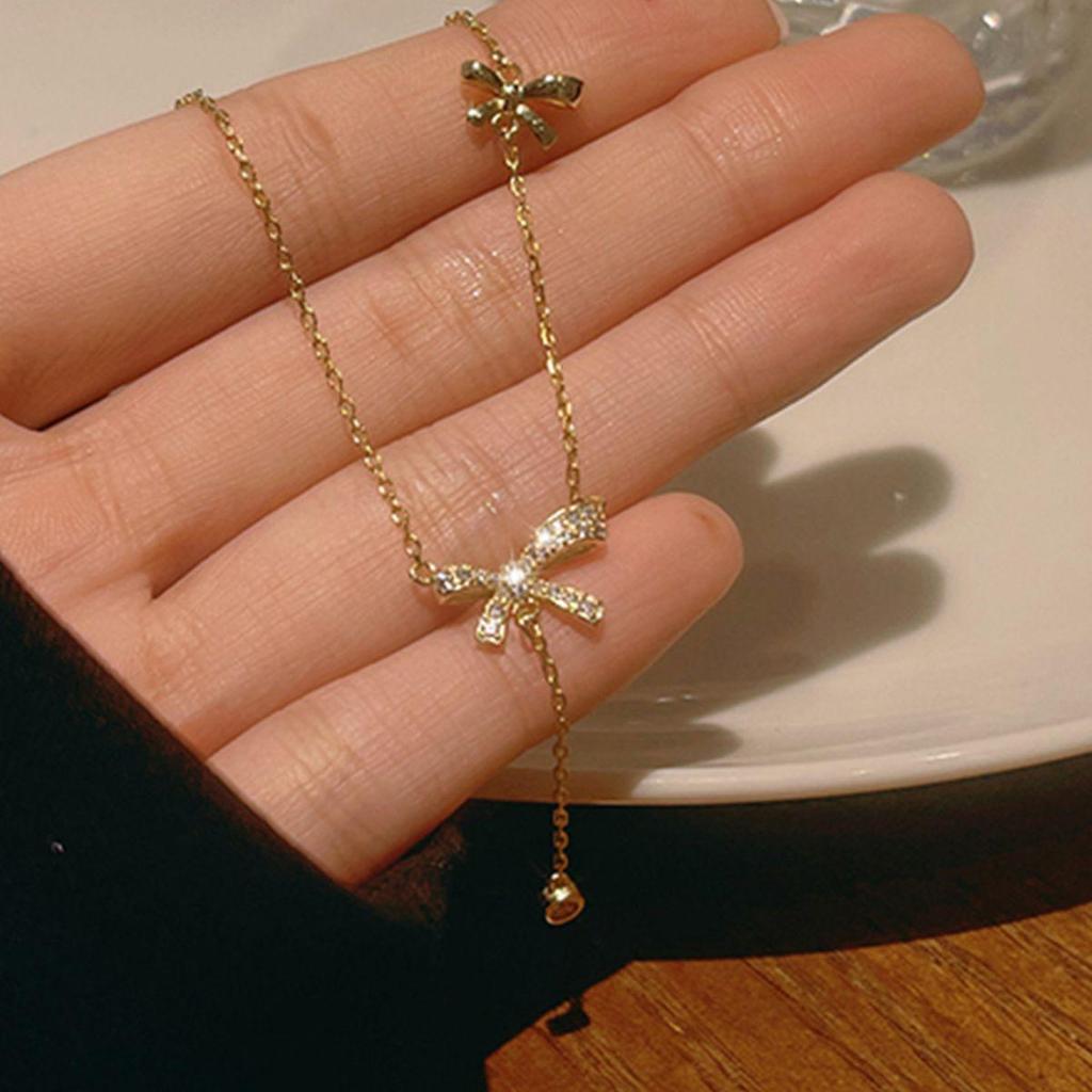 Elegant Japanese & Korean Bow Pendant Necklace: Light Luxury with Tassel for Women