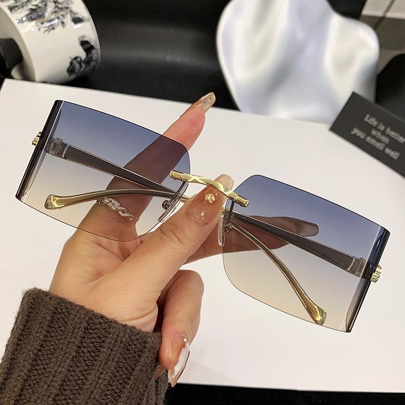 New Curved Lens Leopard Head Metal Frameless Edge Cutting High-Quality Sunglasses 90300