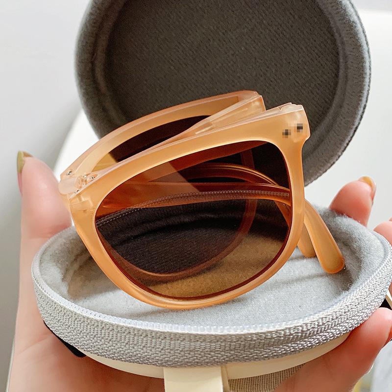 New folding sunglasses female Internet celebrity polarized sunshade sunglasses men's air cushion glasses case