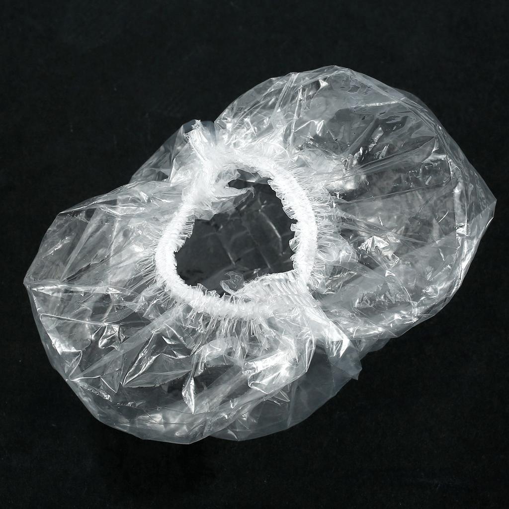 100 ks jednorázových ušních čepiček Vodotěsné průhledné chrániče sluchu s elastickými pásky na cestování Domácí použití Barvení na vlasy Sprcha