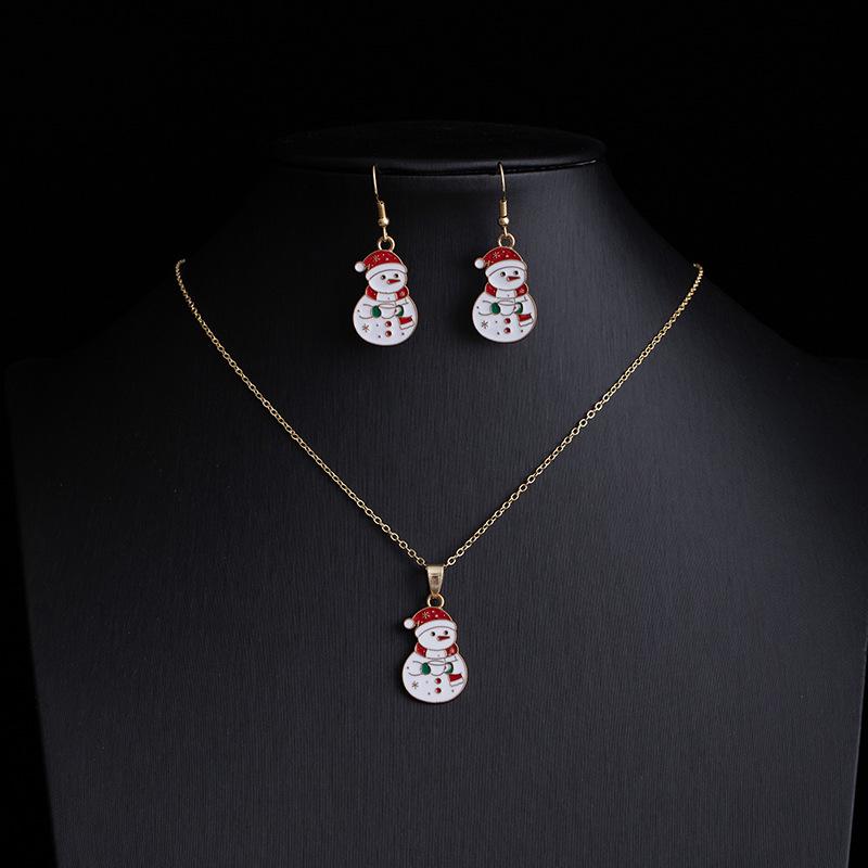 

Christmas Jewelry Set: Reindeer, Santa, Tree & Snowflake Earrings and Necklace