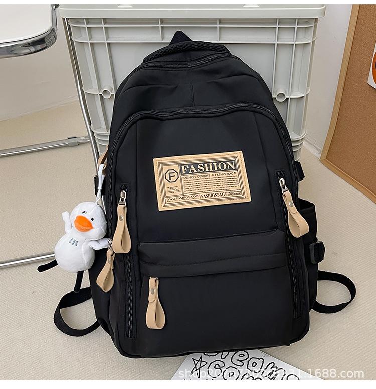 Schoolbag student schoolbag junior high school campus large capacity backpack wholesale simple multi-layer leisure travel computer bag