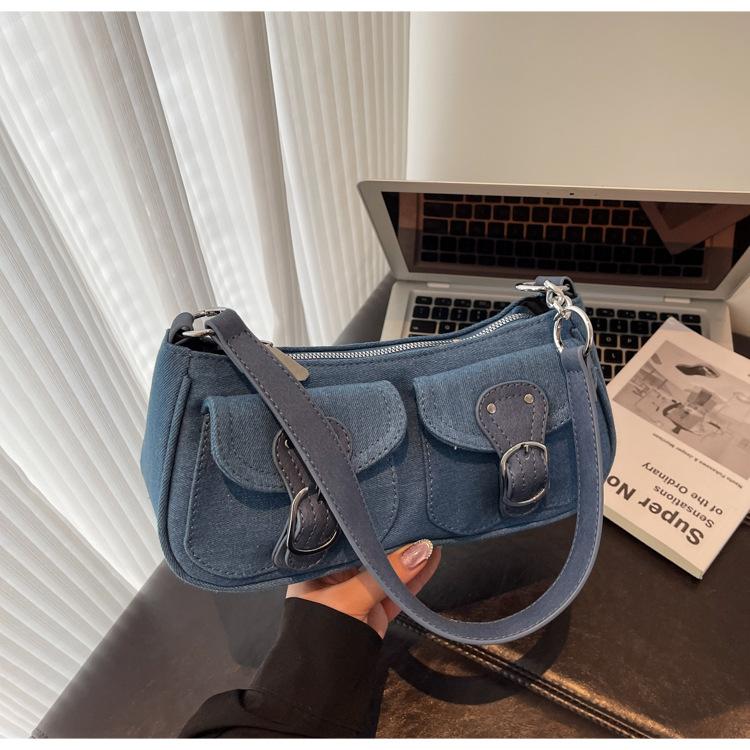 Retro foreign shoulder women's bag 2025 new popular niche design hand carry fashion baguette bag Korean version armpit bag