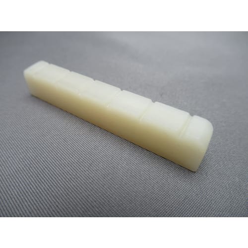 Unbleached, general-purpose grooved shaped nut (shaped nut) made of cow bone for classical guitars, 52mm wide