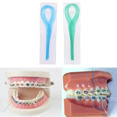 70 ks/krabice Navlékač dentální nitě Zubní tažná šňůra 0,5 mm Crown Brace Bridge Implantát Hoop Threading Braces Trakční nástroj