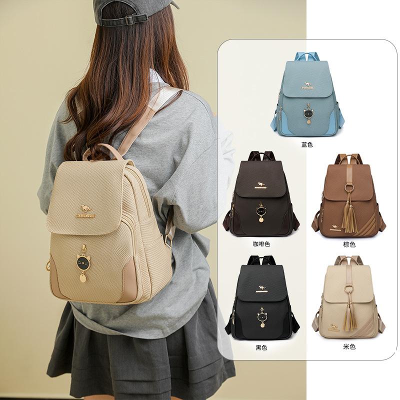 Schoolbag backpack women pu fabric texture commuting large capacity waterproof travel anti-theft backpack niche retro Baigou bag