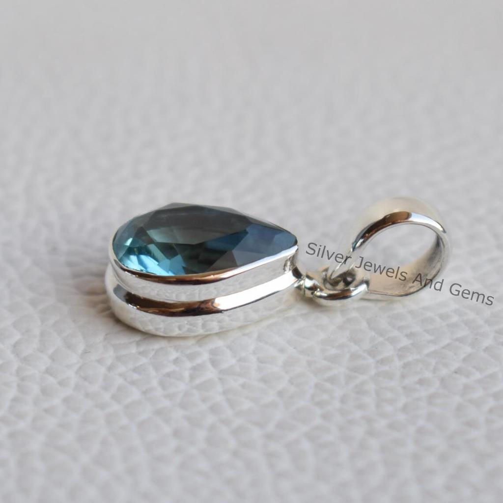 Handmade Teardrop Blue Topaz Pendant: 925 Sterling Silver