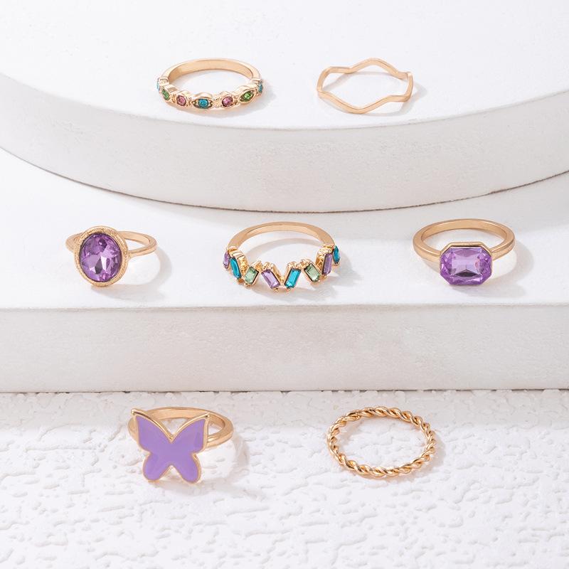 European and American new dripping butterfly imitation gemstone and diamond ring set Geometric twist ring seven-piece set
