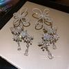 Diamond butterfly hollow water drop earrings heavy industry high sense light luxury ear hanging fashion niche design earrings women