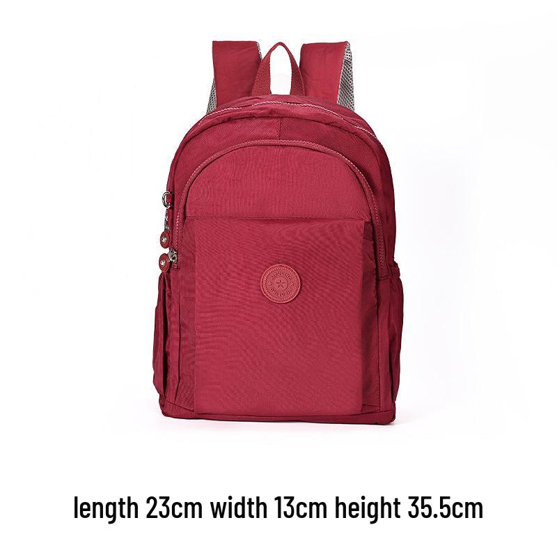 

Women s Large Capacity Nylon Backpack - Lightweight, Fashionable, Breathable, and Perfect for Travel or School. 23 x 13 x 35.5 cm червоний