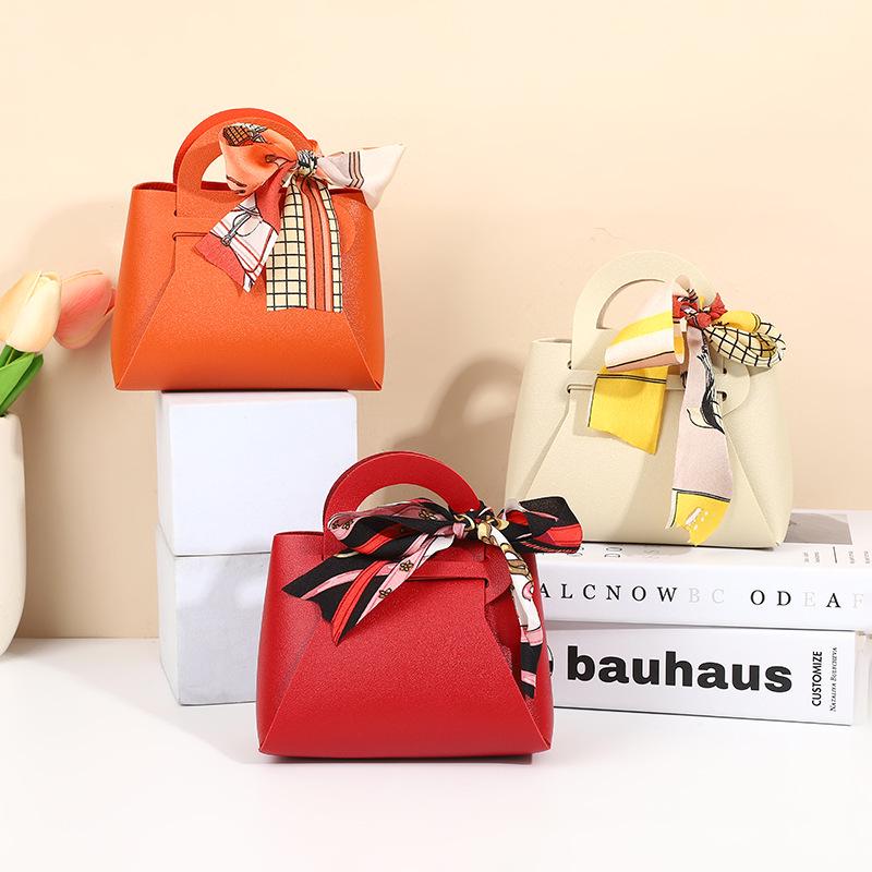 Europäische Handtasche aus PU-Leder im leichten Luxus-Stil & Süßigkeiten-Geschenkbox