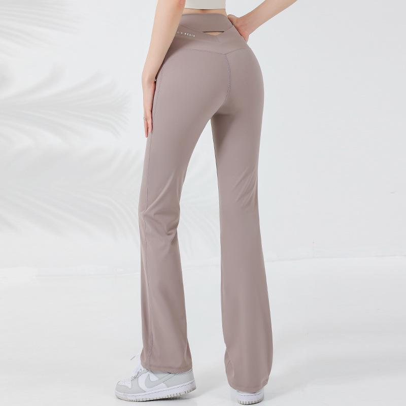 

Персиковые расклешенные леггинсы для йоги: Приятный к коже, Высокоэластичный, Контроль живота с деталью «крест на спине» Small