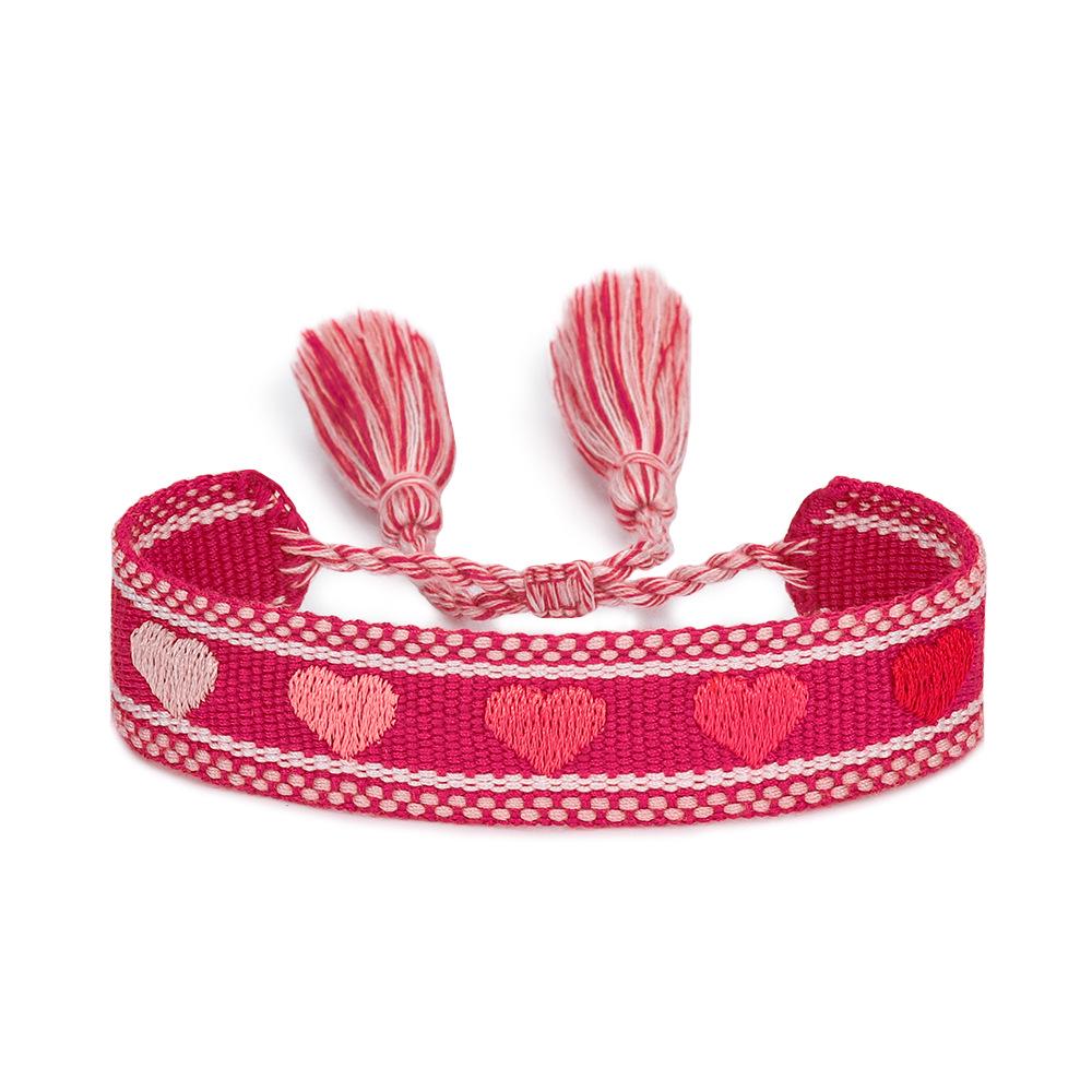 Adjustable European-American Braided Bracelet with Embroidered Heart, Tassel & Chain Ornament, Handmade Spring Style.