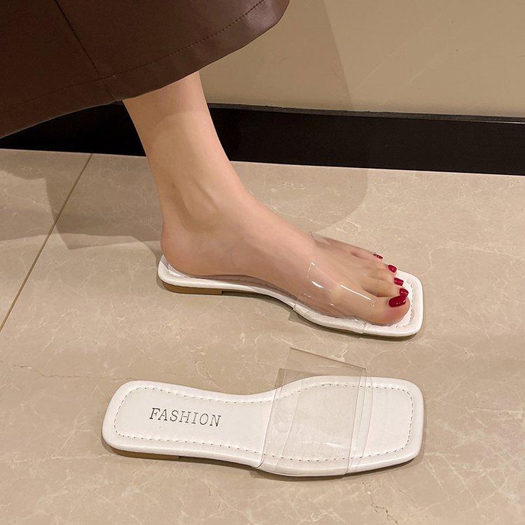 Xiaoxiangfeng Internet celebrity flat-bottomed slippers women's wear 2025 summer new versatile Korean version one-word transparent rhinestone slippers