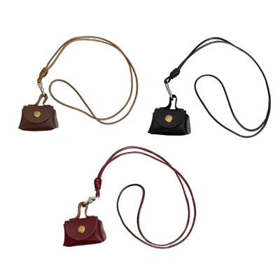 Borsetta a collana in robusta pelle vintage per auricolari e monete, design piccoli e lunghi per donne alla moda