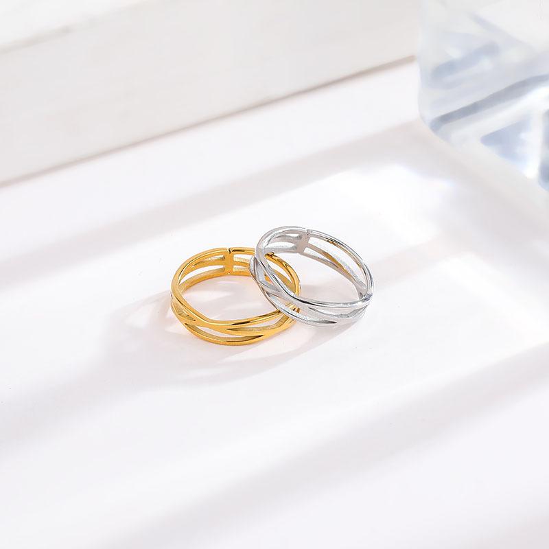 Einfacher Temperament-Ring mit Hohlmuster aus Titanstahl für Damen, hochwertiger, trendiger Schmuck