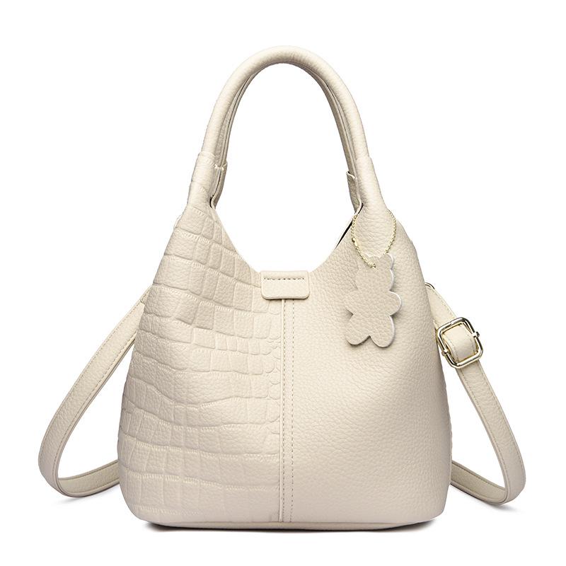 2025 High-End Genuine Leather Women's Shopping Basket Bag with Double-Sided Texture and Leather Tag.