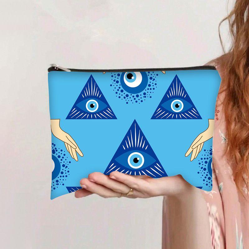 Printed devil's Eye cosmetic bag, travel storage bag, high-value women's clutch bag, wash bag