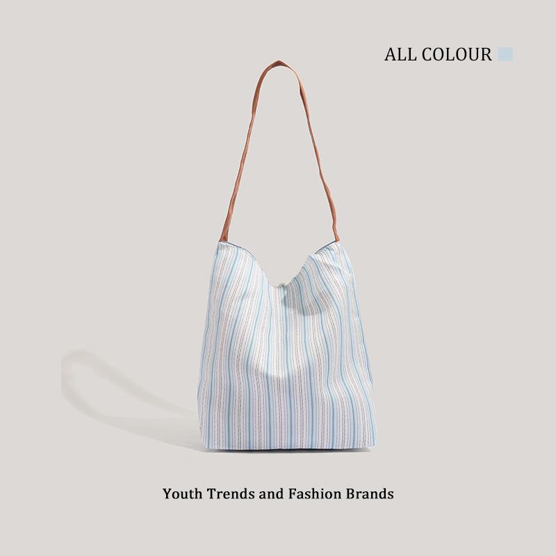 Large capacity striped canvas simple and versatile commuter large capacity bag niche bucket bag