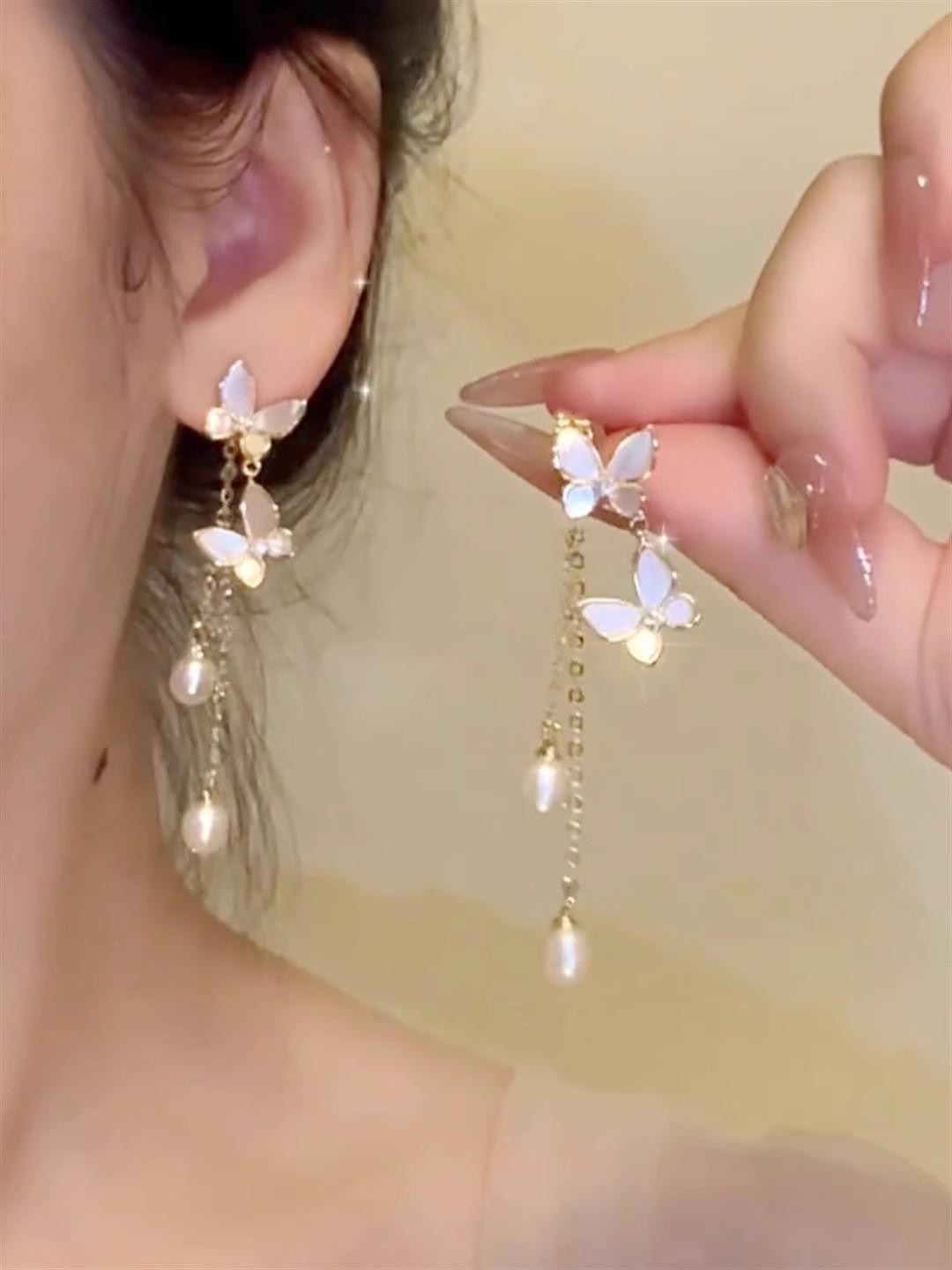 Spring and summer new pearl butterfly earrings female super fairy temperament tassel long stud earrings fairy ears