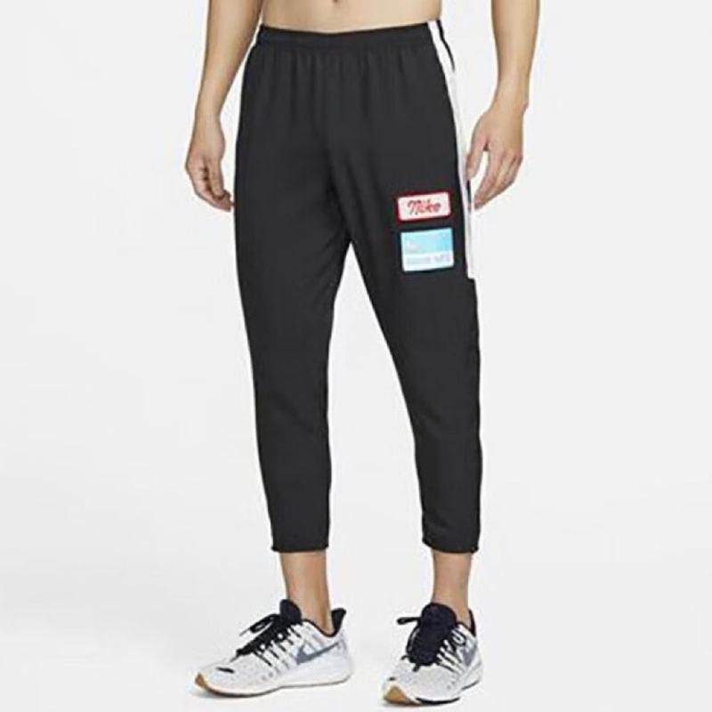 Nike Logo Joggerové tepláky s elastickým pasem Pánské spodní díly Černá DX0889-010