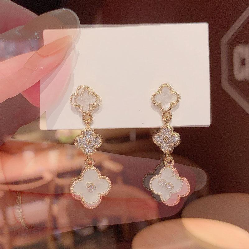 2024 Four-Leaf Clover Silver Needle Earrings: Korean High-End Style, Elegant & Trendy.