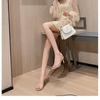 Summer new one-word buckle temperament high heels women's thin heels are beautiful nude thin strap sandals versatile