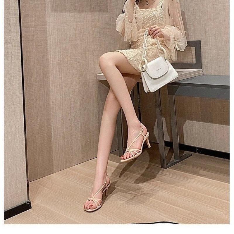 Summer new one-word buckle temperament high heels women's thin heels are beautiful nude thin strap sandals versatile