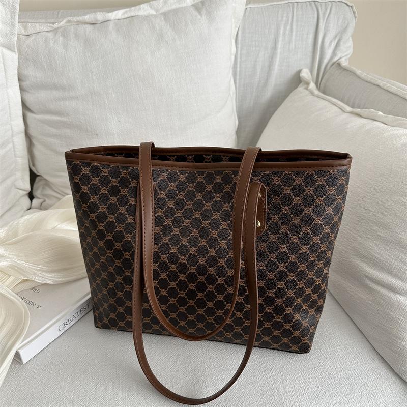 Bag women's personality new trendy niche design simple hand shoulder bag large capacity tote bag