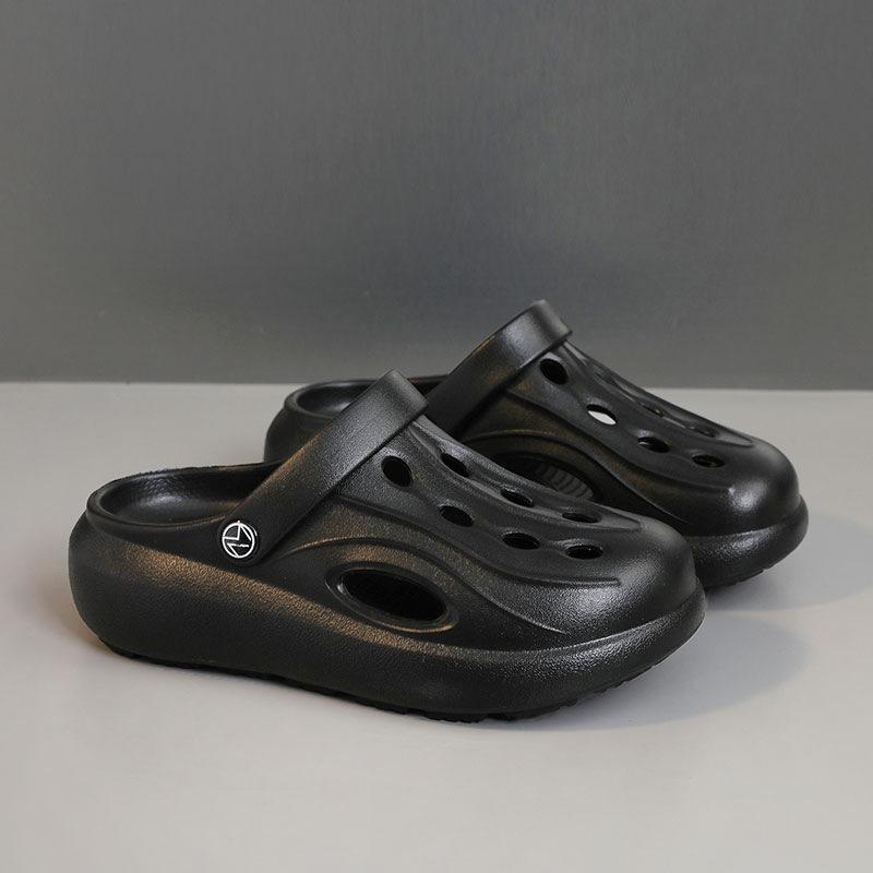 

Новые тапочки женские новые летние дырчатые туфли женские носят универсальные на толстой подошве с мягкой подошвой увеличивающие рост тапочки 35 чёрный