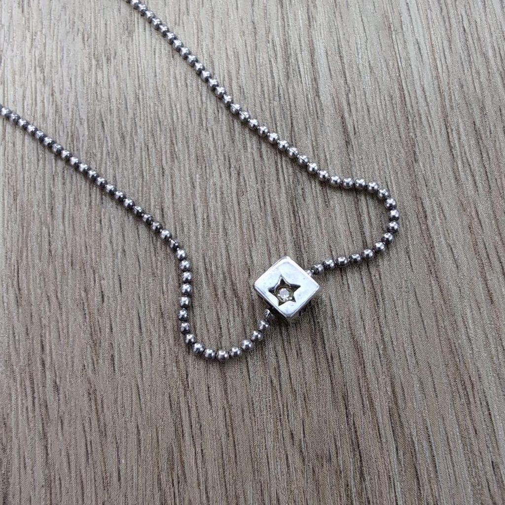 Used moschino silver necklace square dice