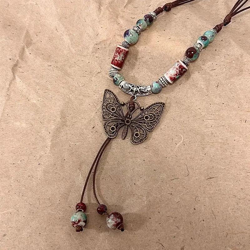 Vintage Ceramic Butterfly Pendant Necklace for Women 2026 New Chinese Ethnic Style Long Sweater Chain Necklace Jewelry Accessory