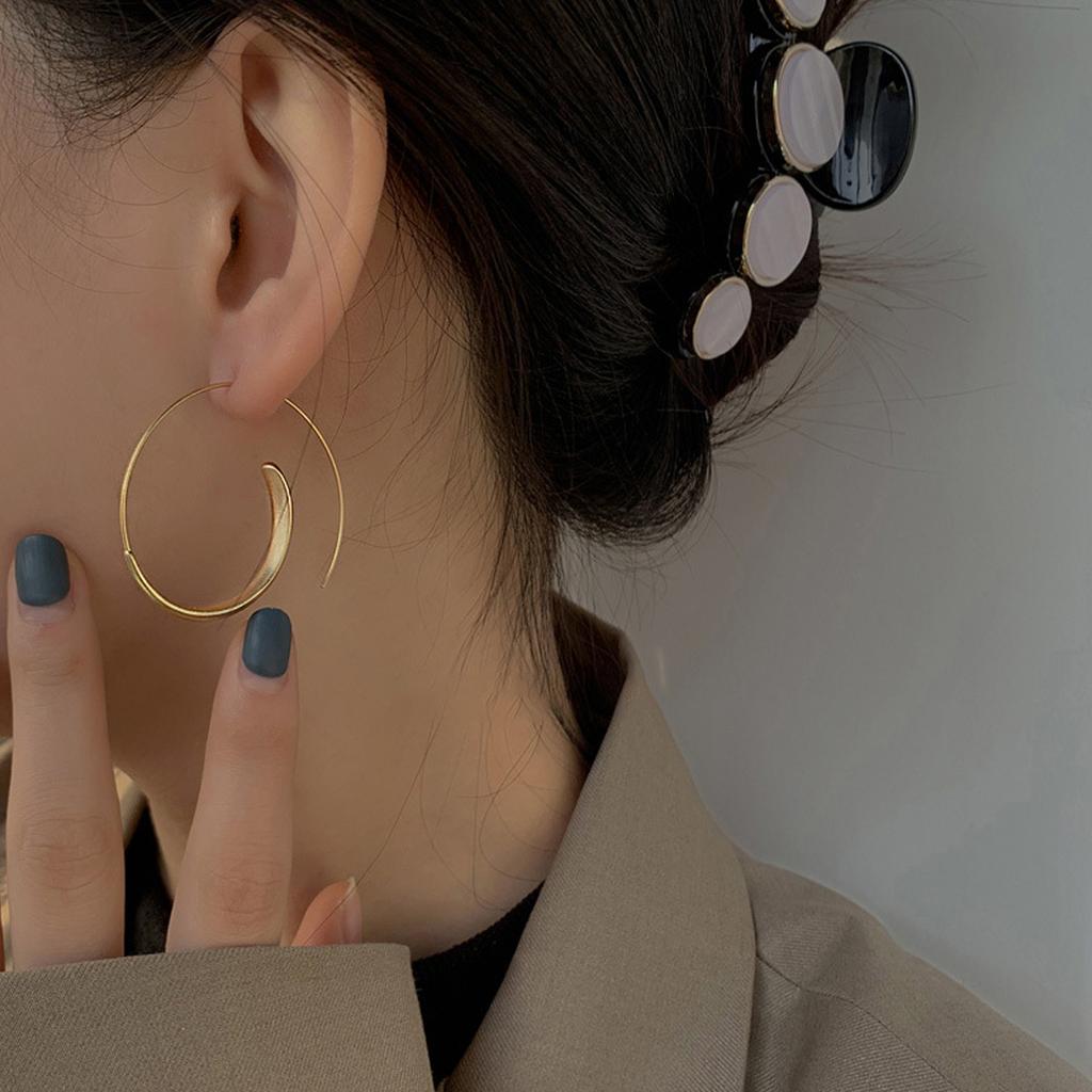 A Pair of Golden Metal Matte End Hoop Earrings with a Easy And Elegant Style, Perfect for Daily Wear, Parties, And Dates