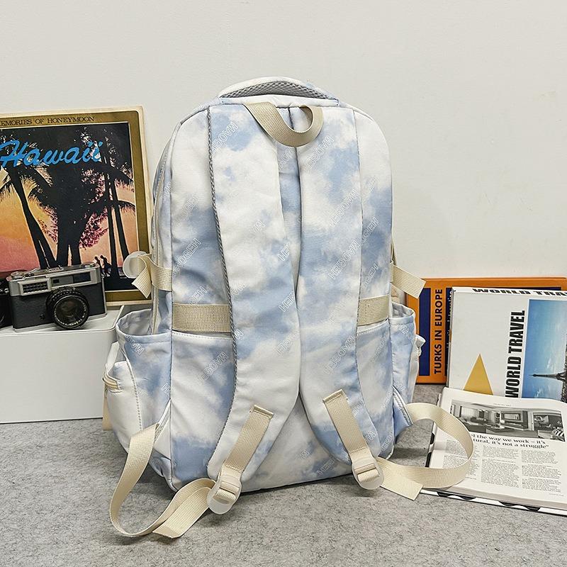 Der neue Schulranzen ist hochwertig, frisch und süß, ein Rucksack mit literarischem Graffiti-Tie-Dye und ein leichter Rucksack für Junior- und Oberstufenschüler.