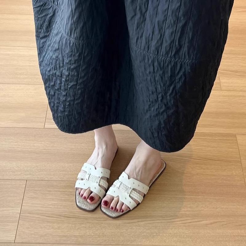 Sheepskin version~ New niche leather rivet one-word slippers women's versatile outer wear comfortable flat-bottomed cool slippers
