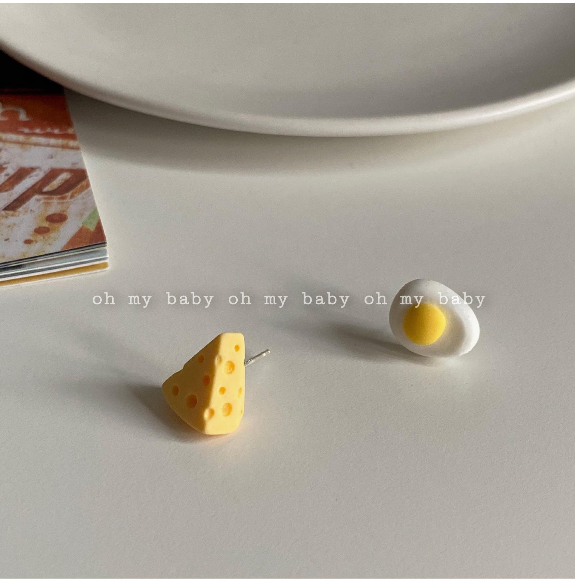 

You can wear it without pierced ears. Asymmetrical cheese and omelette stud earclips are creative niche and cute students, free shipping.